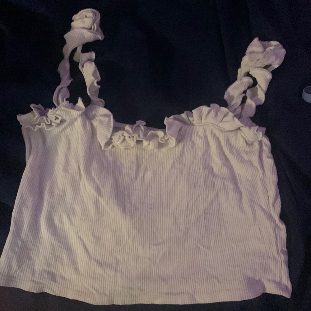 This a white crop top I’m selling it for $10.